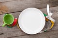 Plate with measure tape, cup, knife and fork. Diet food Royalty Free Stock Photo