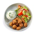 Plate of meat balls and vegetable salad Royalty Free Stock Photo