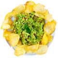 Plate of mexican chips with guacamole and glass beer closeup Royalty Free Stock Photo