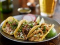 Plate of mexican street tacos garnished with cilantro and onion Royalty Free Stock Photo