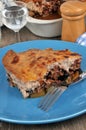 Plate of moussaka with fork close-up
