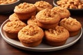 a plate of muffins with peanut toppings Royalty Free Stock Photo
