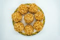 A plate of Murmura Murai Ladoo Puffed Rice in Jaggery Balls Maghe Makar Sankranti Festival