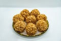 A plate of Murmura Murai Ladoo Puffed Rice in Jaggery Balls Maghe Makar Sankranti Festival