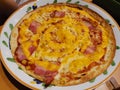 A plate of nacho cheese bacon pizza Royalty Free Stock Photo