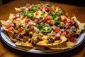 plate of nachos with different toppings, featuring refried beans, cheese, and jalapenos