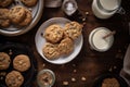 A plate of oatmeal raisin cookies and a glass of milk