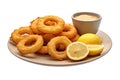 Plate with Onion rings or spanish calamares a la romana with mayonnaise bowl and lemon