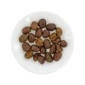 Plate of organic whole shelled roasted chestnuts