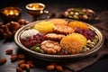 Plate with oriental sweets. Lohri fire festival in India