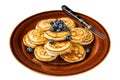 Plate with pancakes with fresh blueberries and syrup . Isolated on white background. Top view. Royalty Free Stock Photo