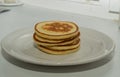 Plate with pancakes on white background Royalty Free Stock Photo
