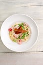 Plate of pasta bacon, cheese, cherry tomatoes Royalty Free Stock Photo