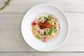 Plate of pasta bacon, cheese, cherry tomatoes Royalty Free Stock Photo