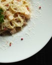 Plate of pasta with cheese closeup Royalty Free Stock Photo