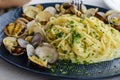 A plate of Pasta with clams and sauce. Traditional italian food.