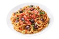 Plate of pasta puttanesca with olives, tomato sauce, anchovies and capers on white background Royalty Free Stock Photo