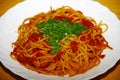 Plate with pasta, tomatosauce, basil and other herbs seafood Royalty Free Stock Photo