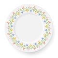 Plate with a pattern of lilies on a white background. A wreath of flowers is suitable for registration of bright spring