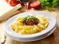 Plate of penne pasta with bolognese sauce Royalty Free Stock Photo