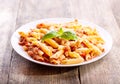 Plate of penne pasta bolognese Royalty Free Stock Photo