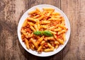 Plate of penne pasta bolognese