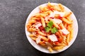 Plate of penne pasta with tomato sauce and parmesan Royalty Free Stock Photo