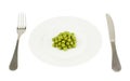 Plate with a pile of peas isolated Royalty Free Stock Photo