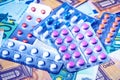 Plate with pills on the background of euro bills. The concept of the expensive cost of healthcare Royalty Free Stock Photo