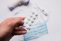 Plate with pills in hand and medicine Royalty Free Stock Photo