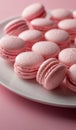 Plate of Pink Macaroons on Pink Table Royalty Free Stock Photo