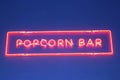 Plate popcorn made from red neon lights