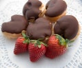 Plate of profiteroles and strawberries