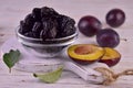 Dried plums in a bowl.Prunes.Close-up.