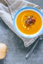 A plate of pumpkin soup with a jamon, garlic Royalty Free Stock Photo