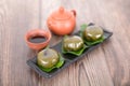 A plate of Qingming Festival food, glutinous rice, wormwood, green dumplings and tea sets