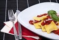 Plate with Raviolis on black Royalty Free Stock Photo