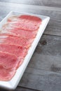 plate of raw beef brisket slices Royalty Free Stock Photo