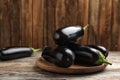 Plate with raw ripe eggplants Royalty Free Stock Photo