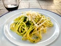 Plate with ready to eat spaghetti pesto Royalty Free Stock Photo