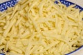 plate with ready-to-use grated Mozzarella