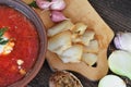 A plate of red borscht with lard and onions on the table Royalty Free Stock Photo