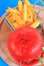 Plate of red hamburger and fries Royalty Free Stock Photo