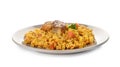 Plate with rice pilaf and meat on white