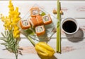 Plate with rolls on white background. Royalty Free Stock Photo