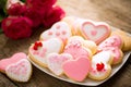 Plate of rose and red valentines cookies Royalty Free Stock Photo