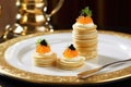 plate of russian blini with caviar and sour cream