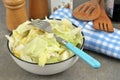 Plate of salad with a fork served at the table close-up Royalty Free Stock Photo