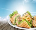 Plate of sandwiches on the desk Royalty Free Stock Photo