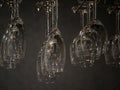Clear champagne and wine glasses on hanging rack Royalty Free Stock Photo